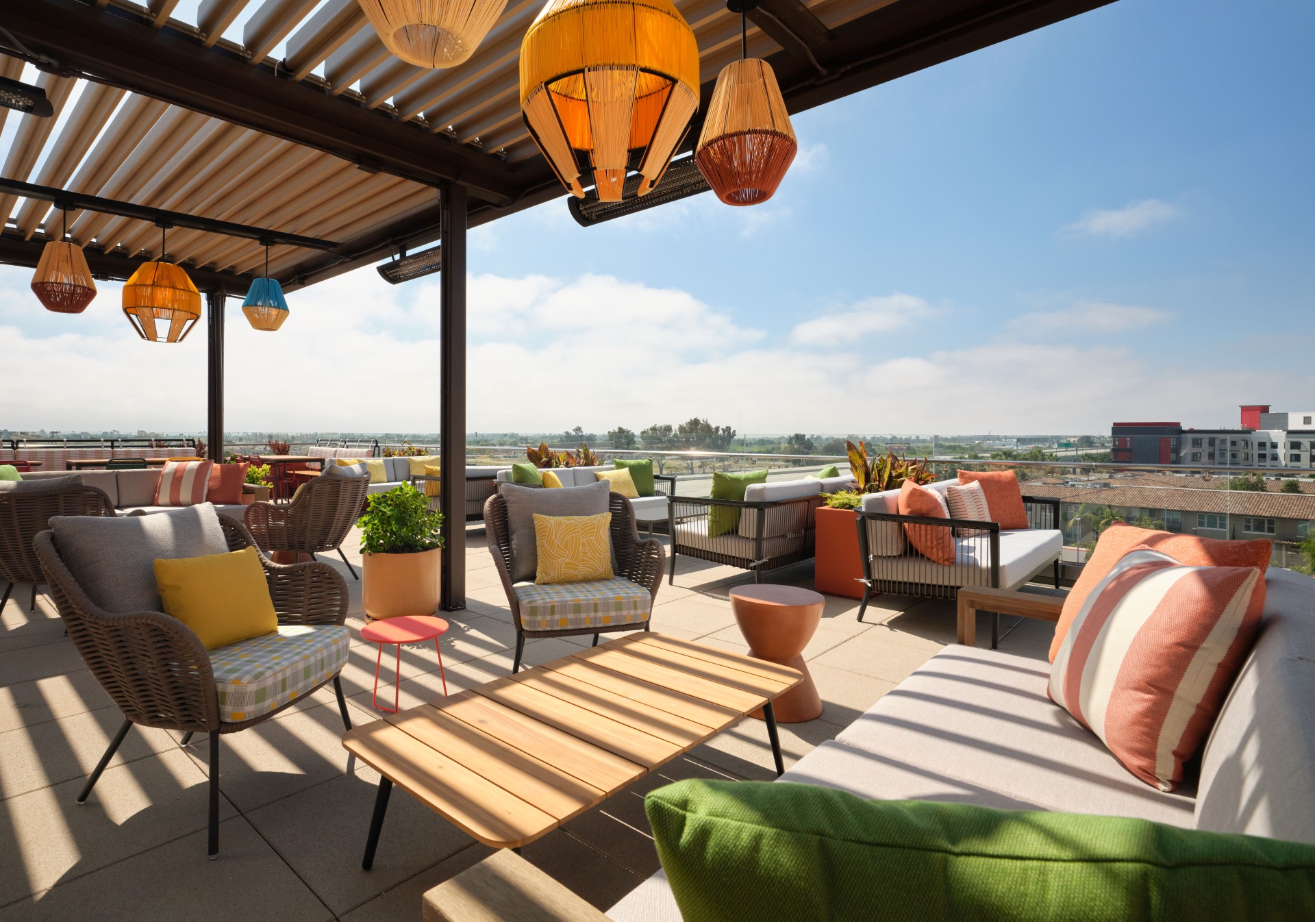 a patio with chairs and tables