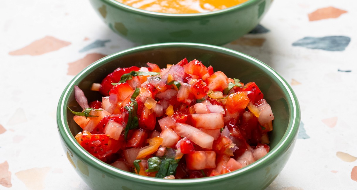 a bowl of salsa and a bowl of soup