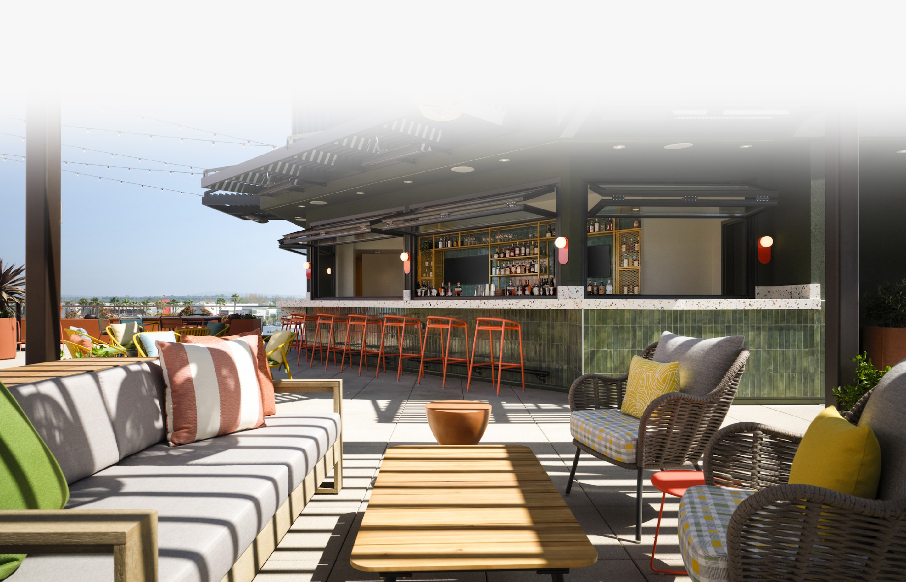 a patio with chairs and tables