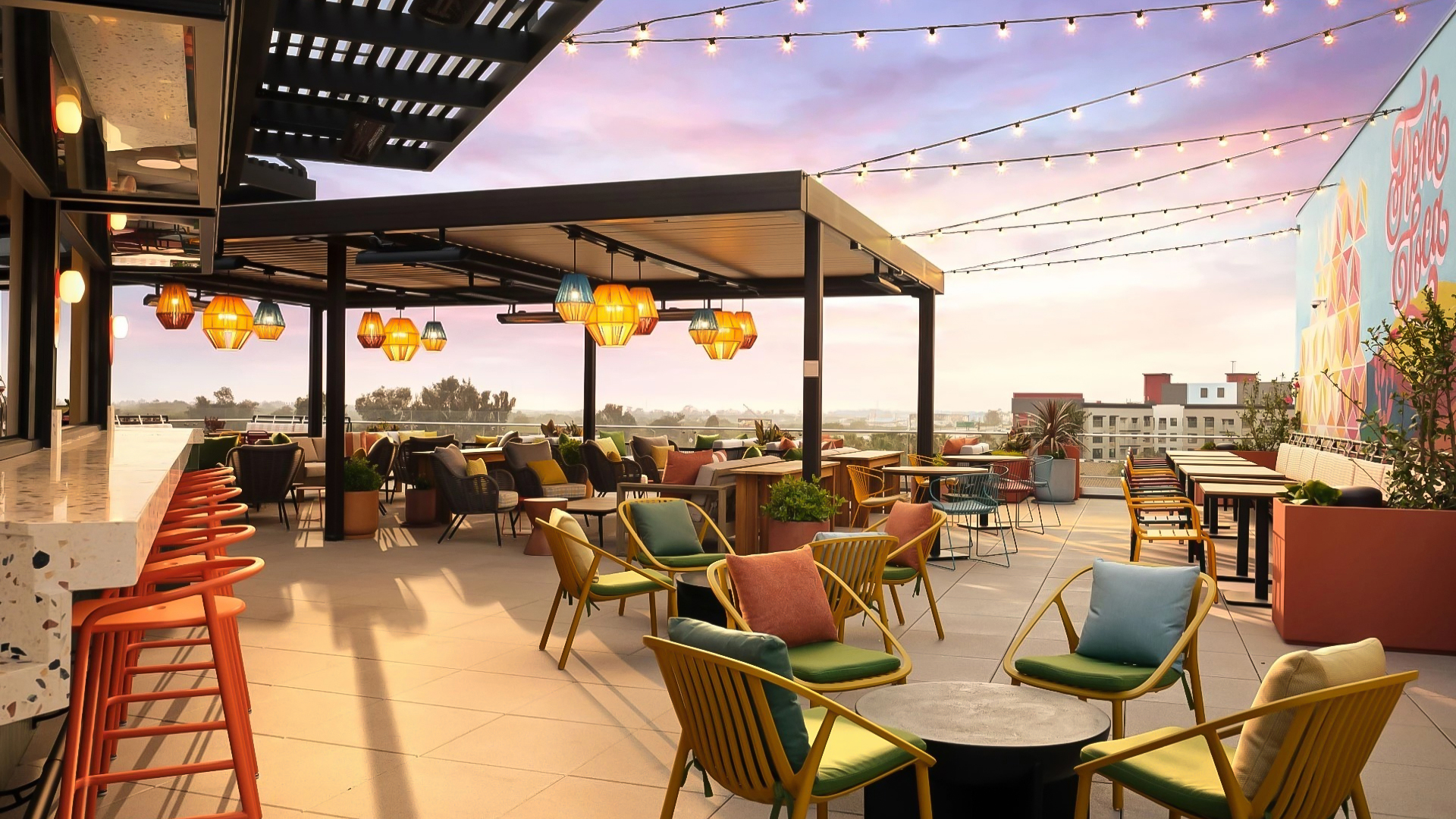 a patio with chairs and tables