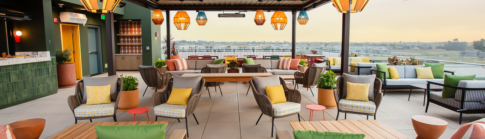 a patio with chairs and tables