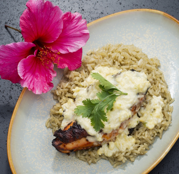 a plate of food with a flower