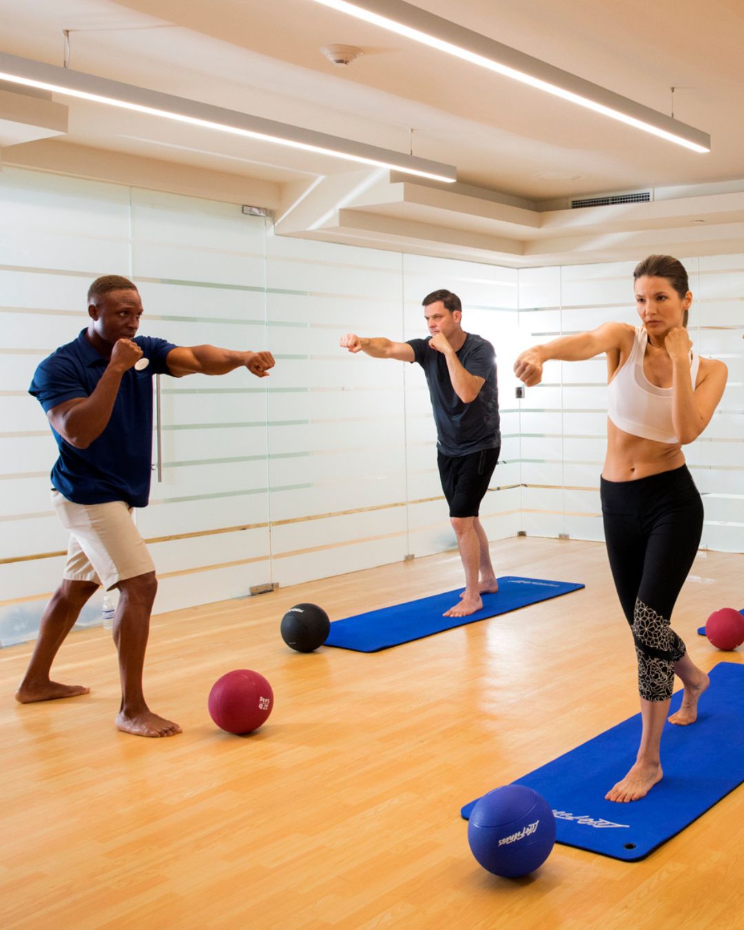a group of people in a gym