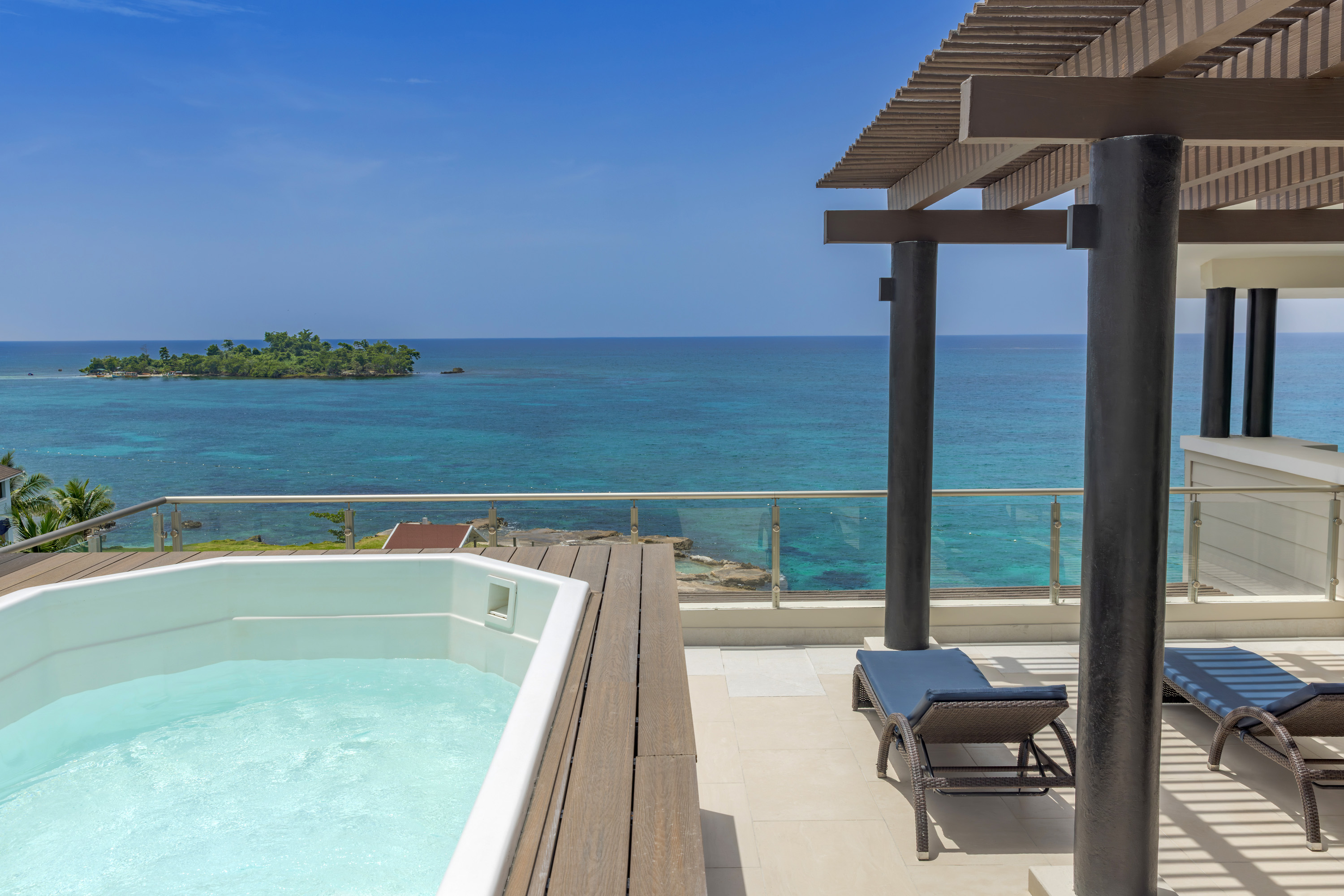 a hot tub overlooking the ocean