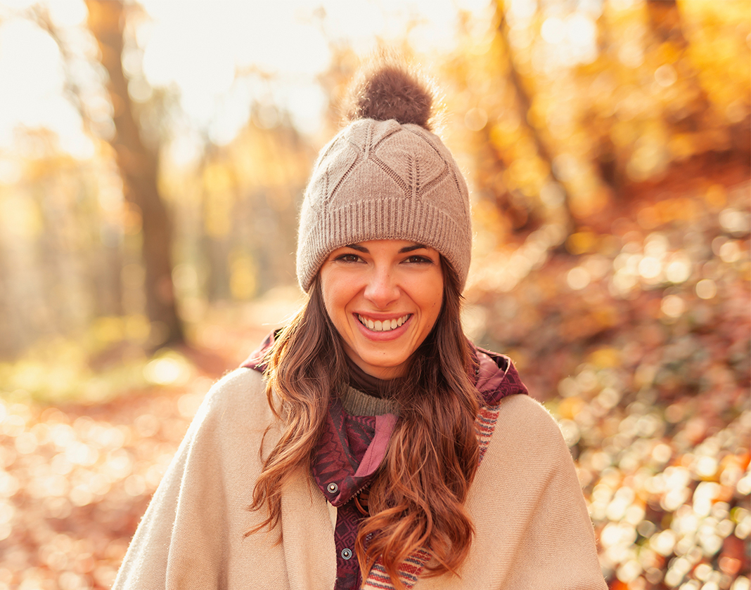 a woman smiling at camera
