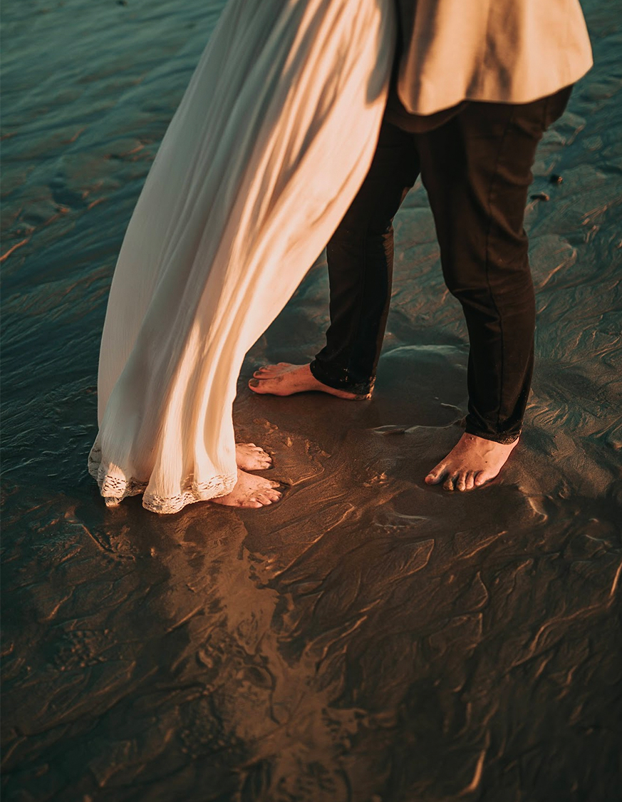 a man and woman holding hands