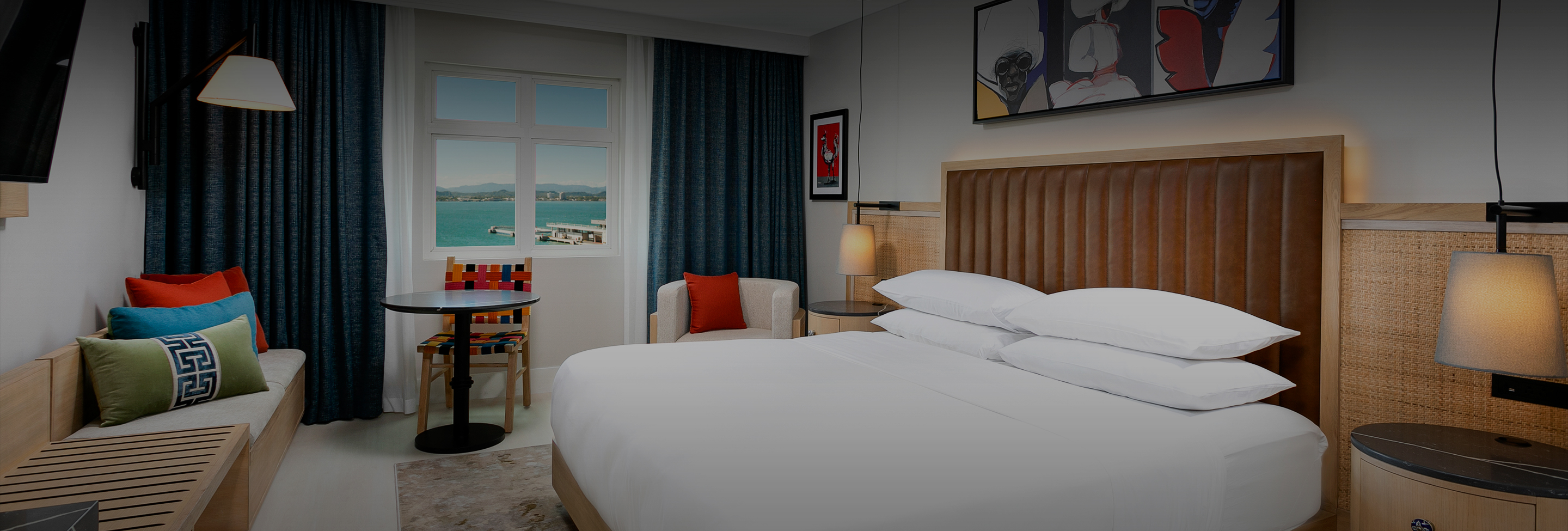 a bedroom with a bed and a couch