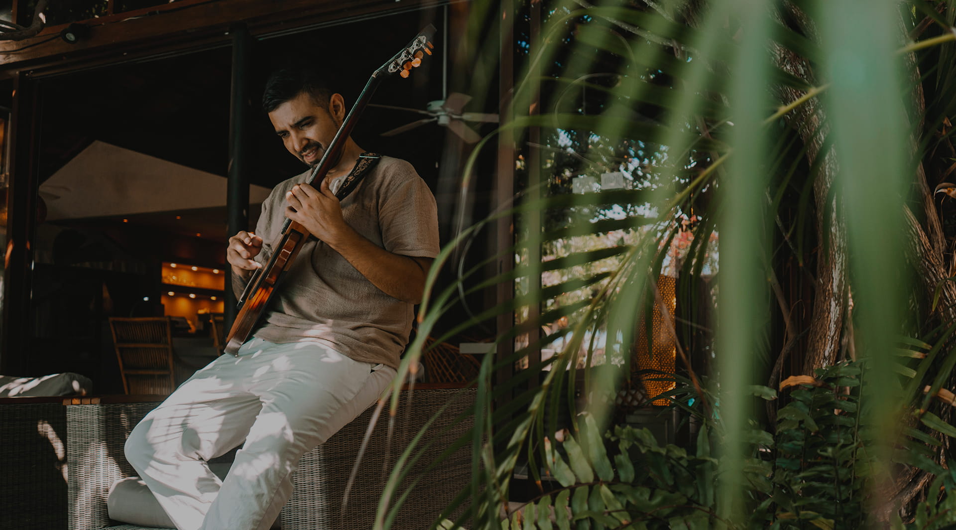 a man playing a guitar