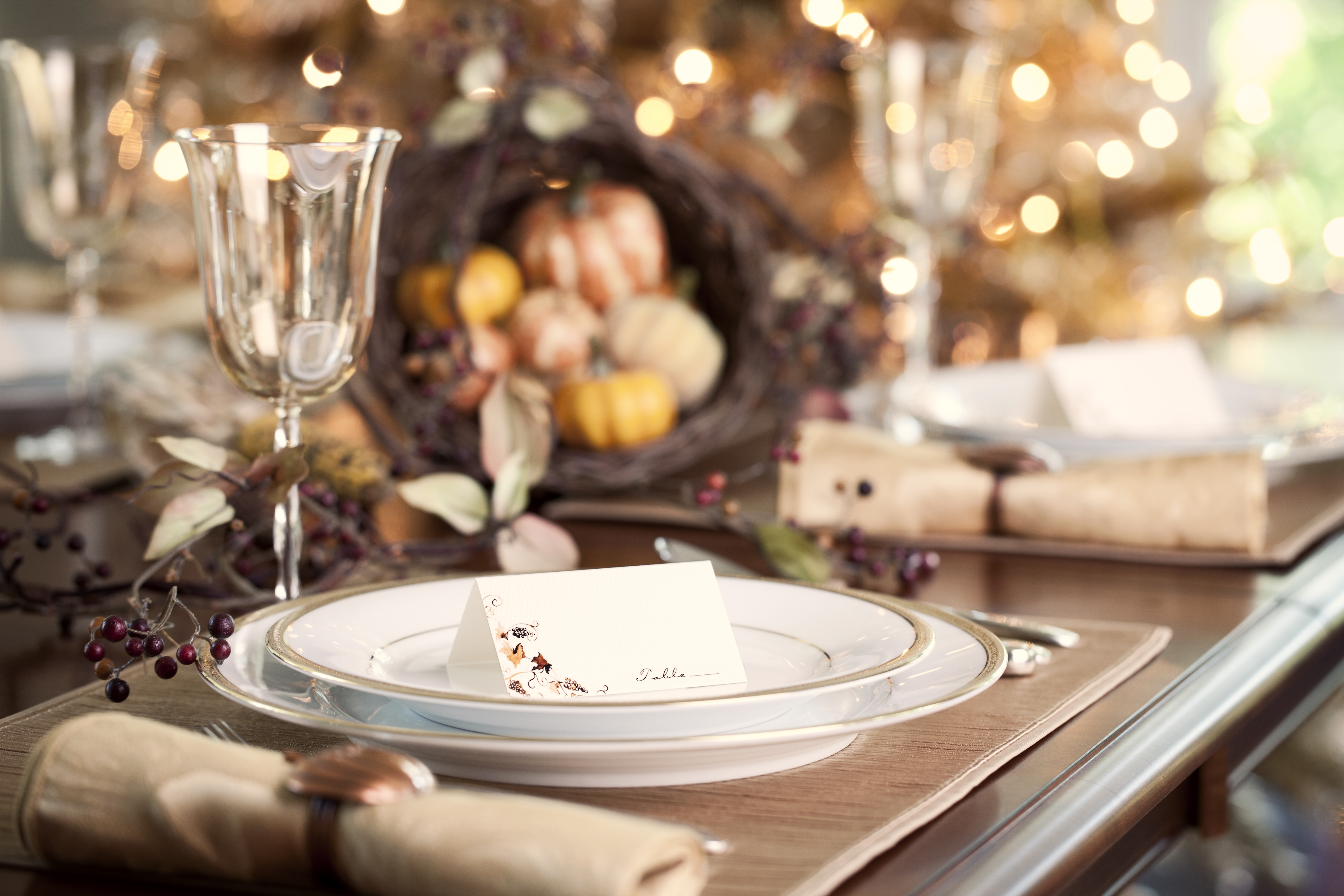 a table with plates and a card on it