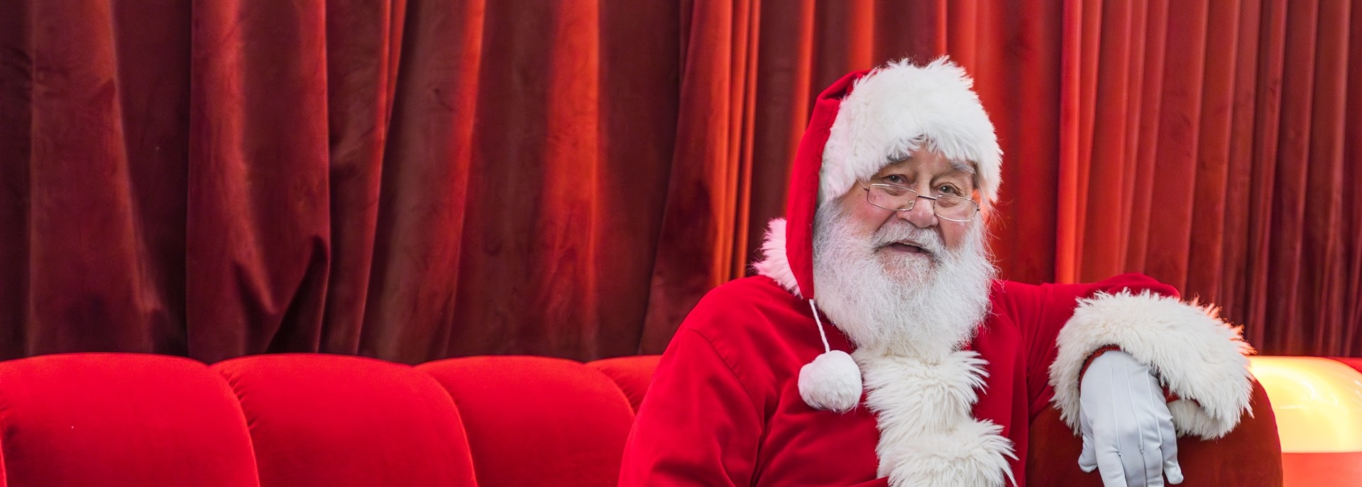 a man in a santa garment