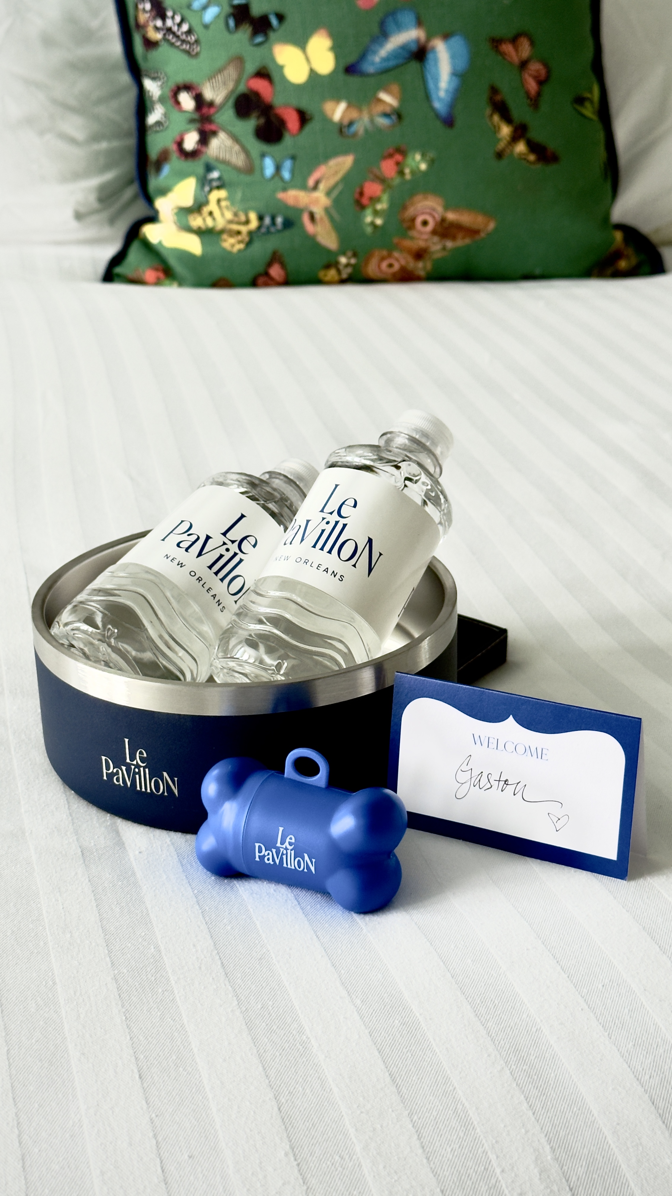 stainless steel Le Pavillon logo'd dog bowl with custom sanitation bag holder
