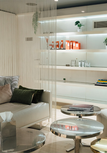 Products on shelves with overhead lighting.