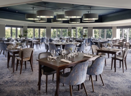 a room with tables and chairs