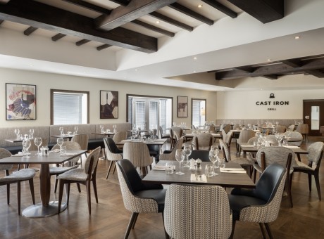 a restaurant with tables and chairs