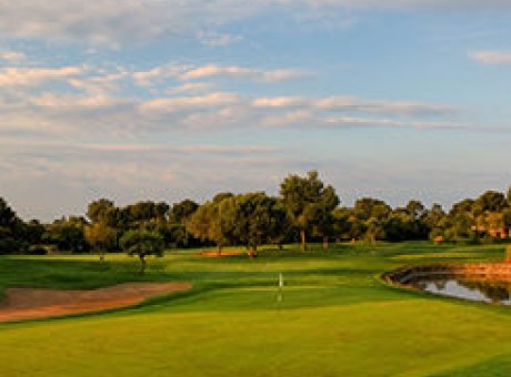fuzzy view of property during the day with a lake and a clear sky