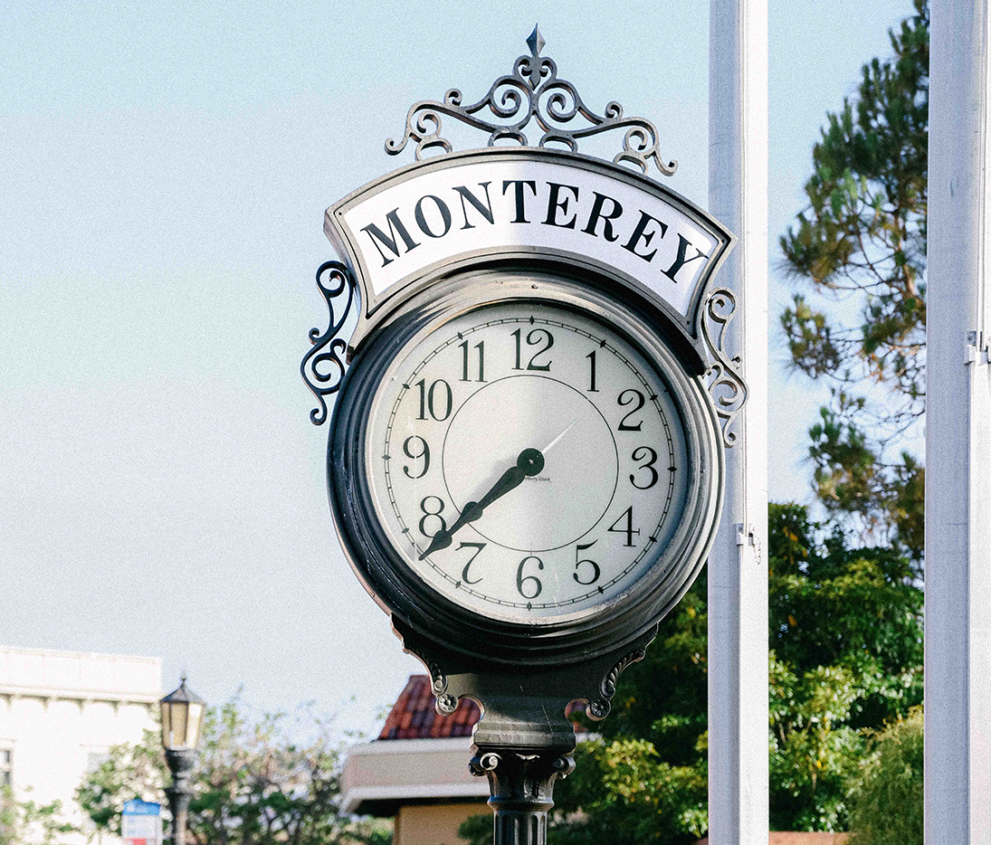 a clock on a pole