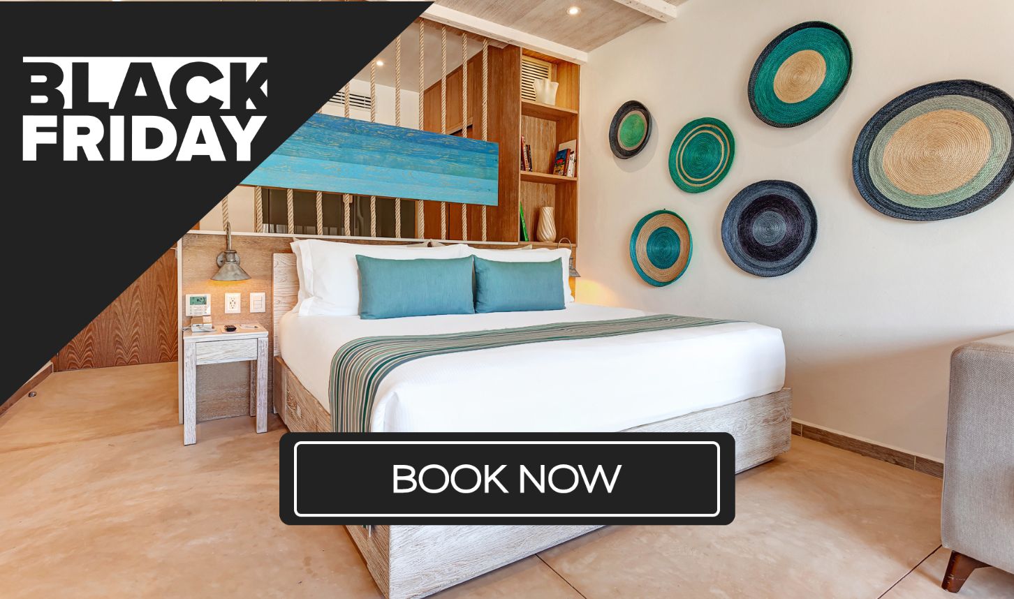 a bed with blue and white pillows