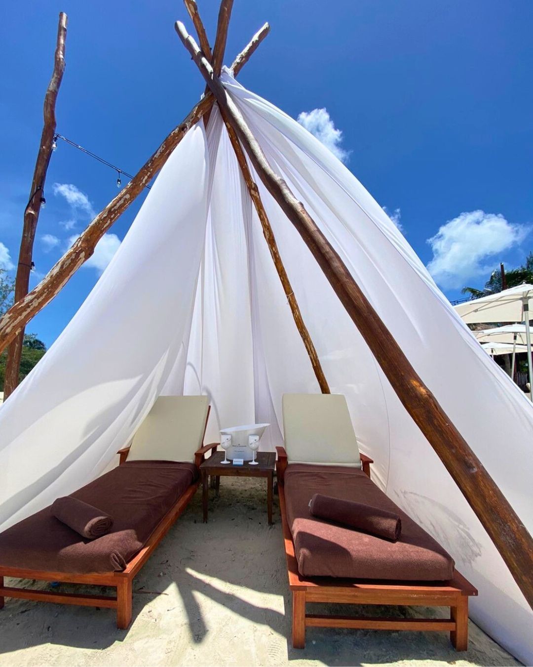 two chairs under a tent