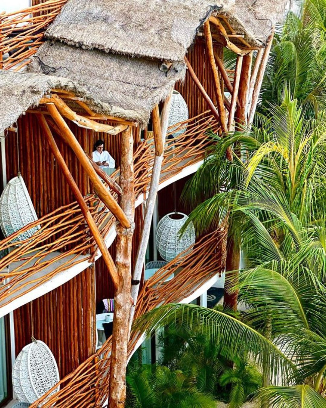 a person on a balcony of a building