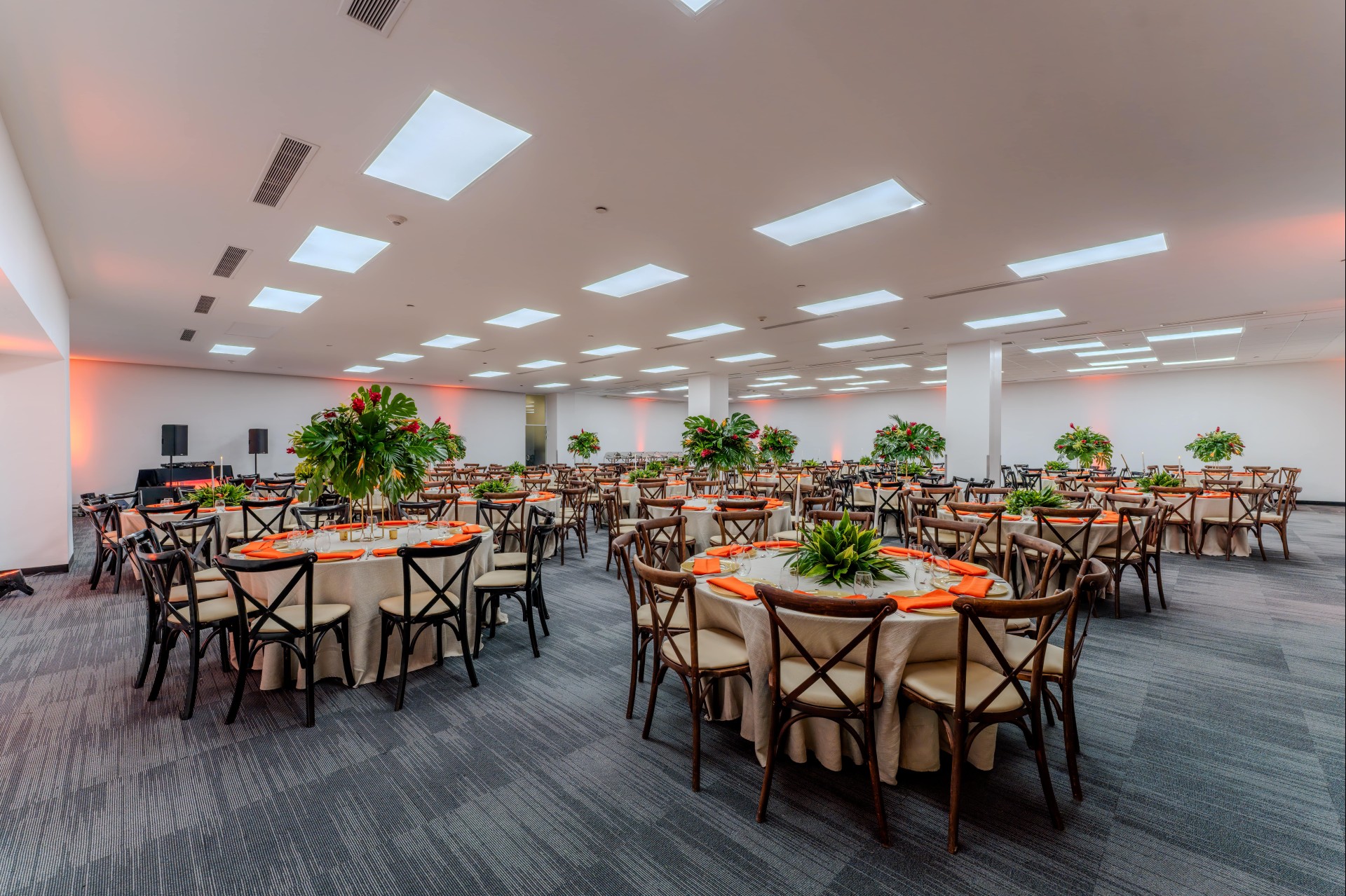 a room with tables and chairs
