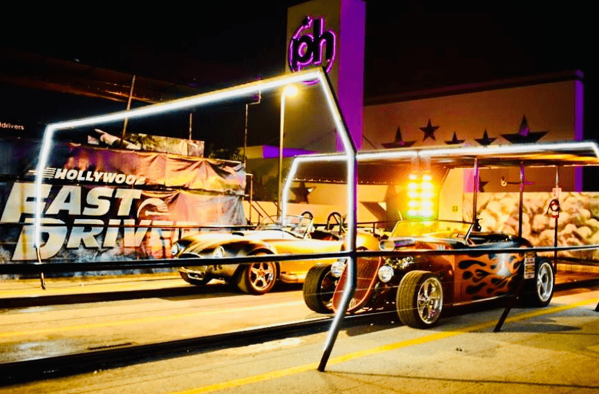 a group of cars parked on a street