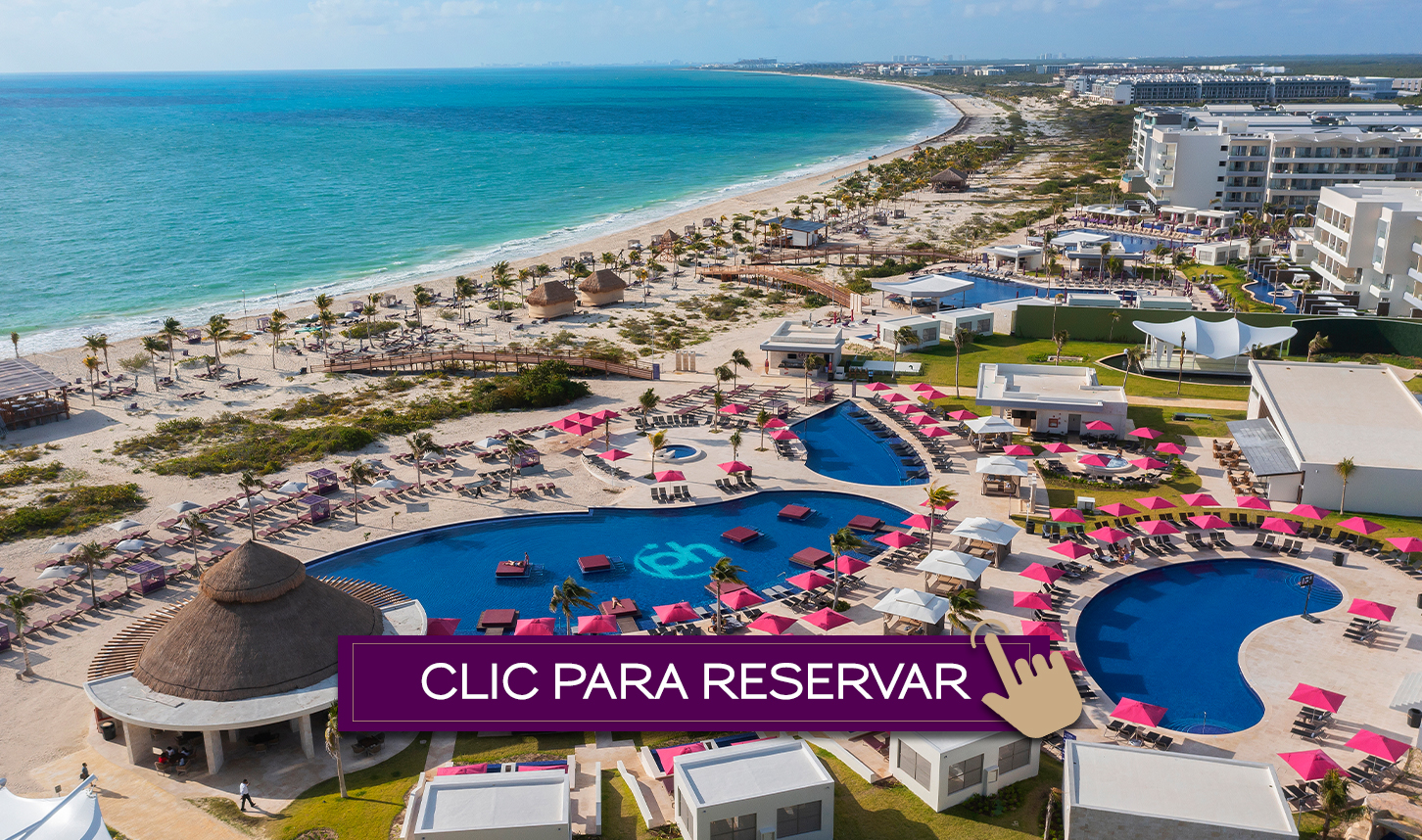 a resort with a pool and beach