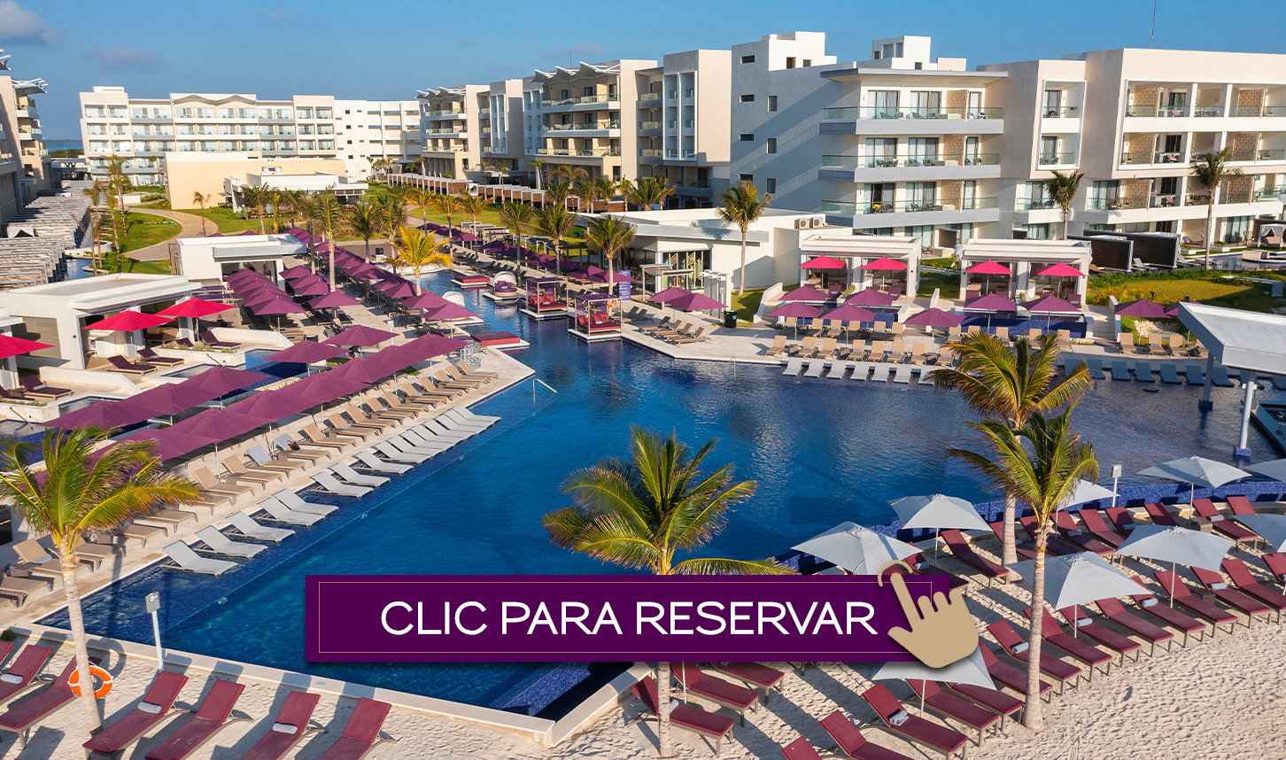 a pool with umbrellas and chairs in a resort