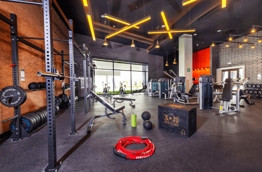 a gym with equipment and a box