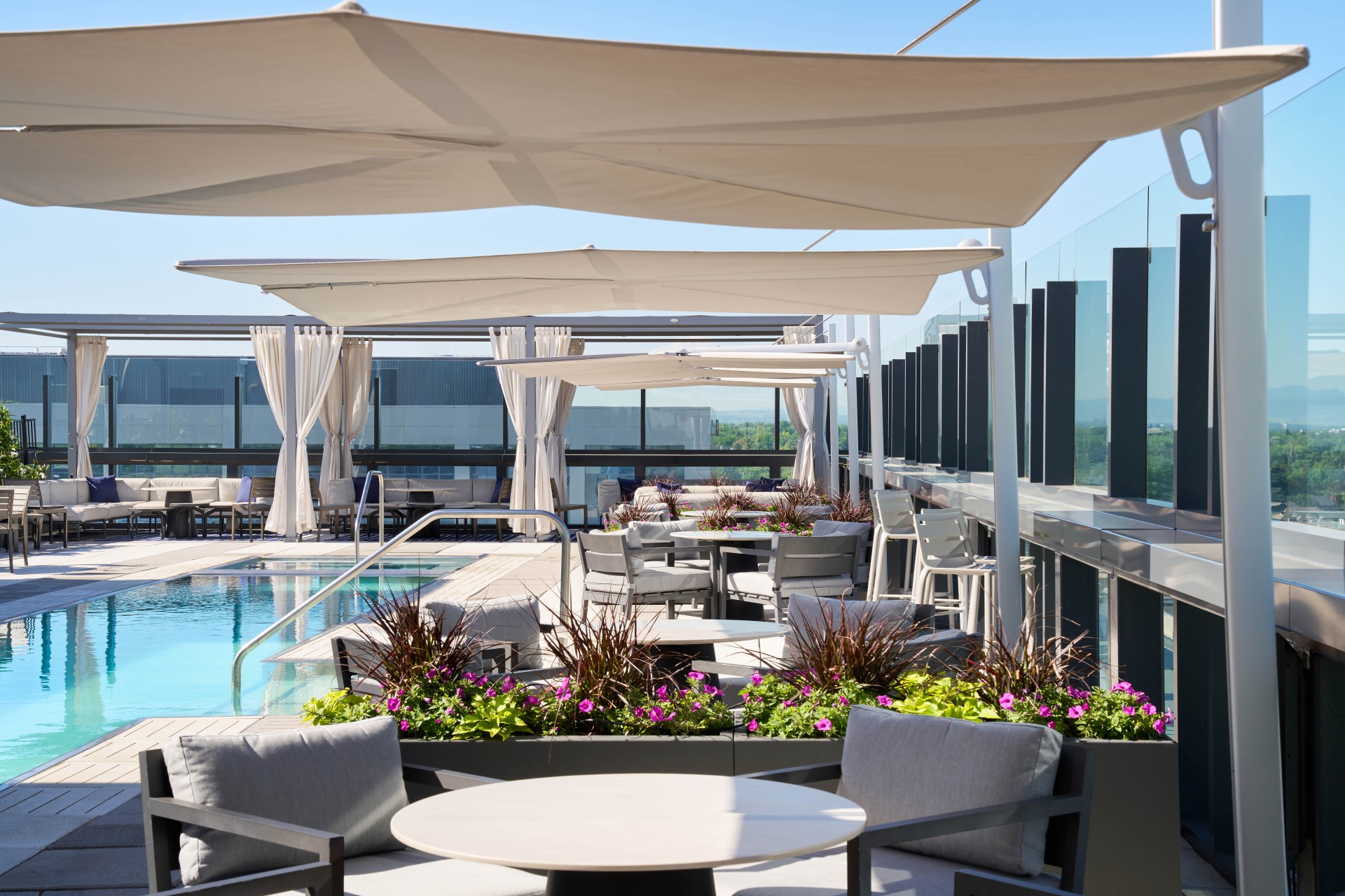 a pool with tables and chairs main