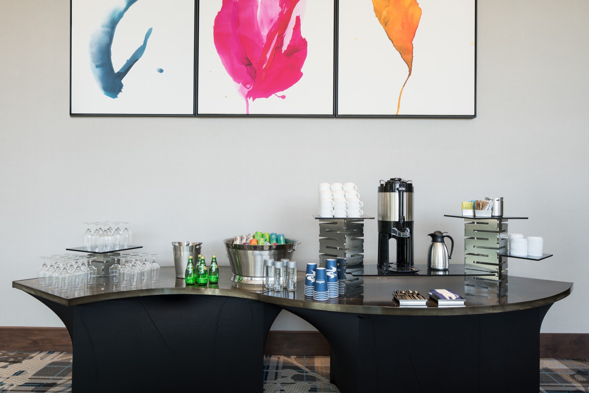 a table with drinks and cups on it main