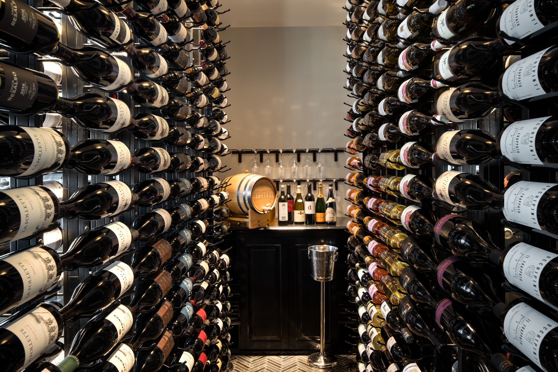 a wine cellar with many bottles main