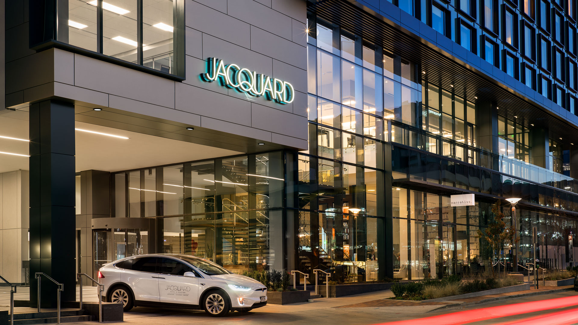 a car parked outside of a building