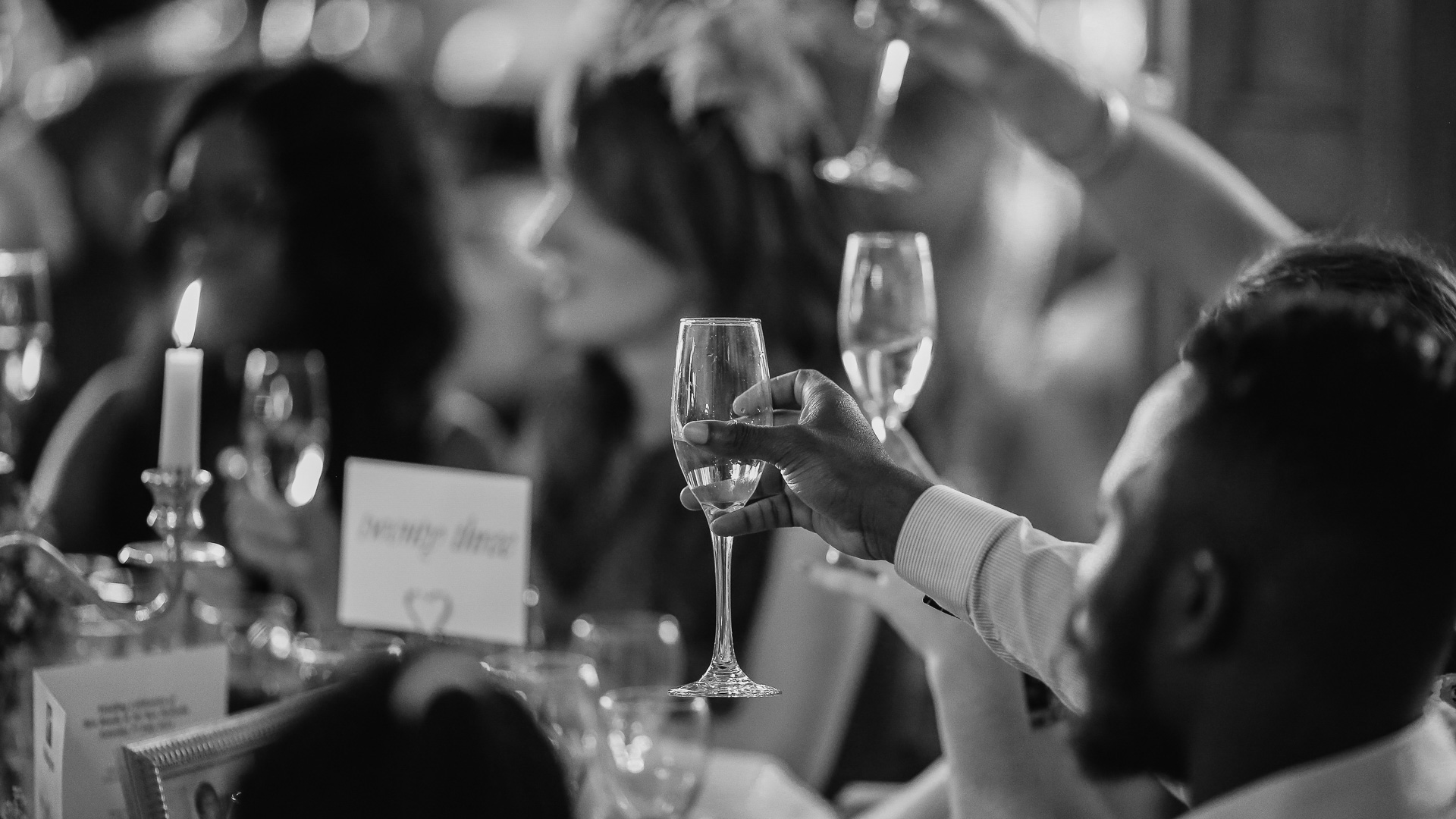 a person holding a wine glass