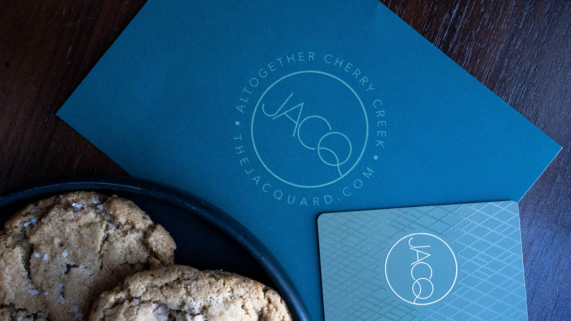 a plate of cookies and cards