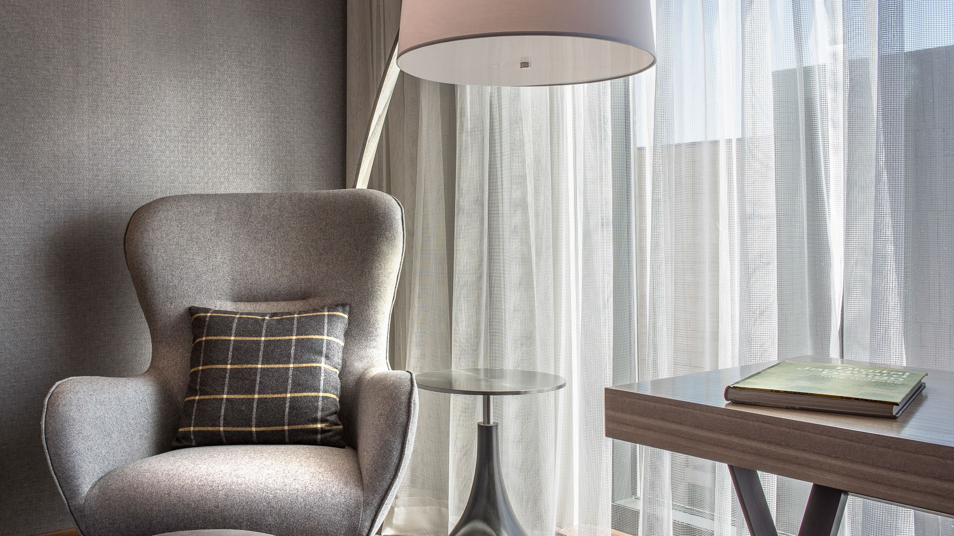 a lamp next to a chair