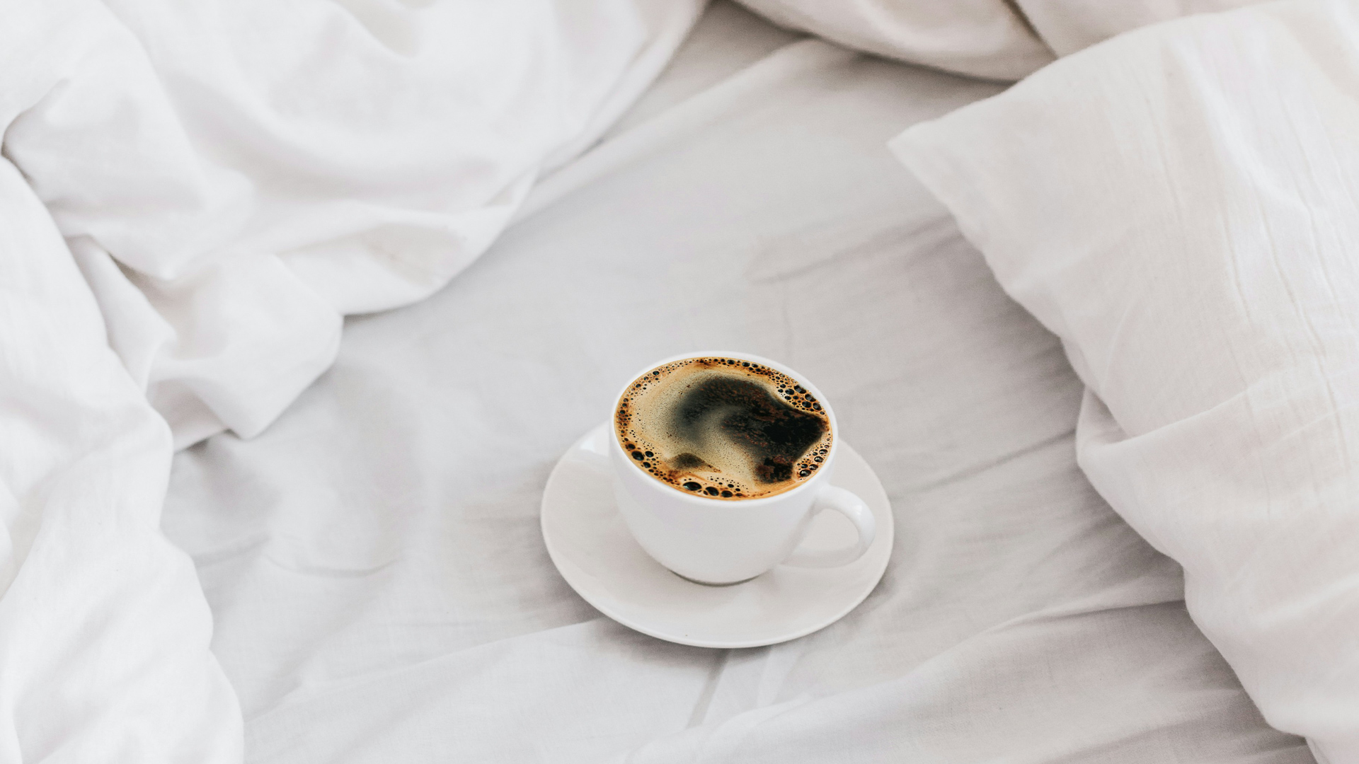a cup of coffee on a saucer