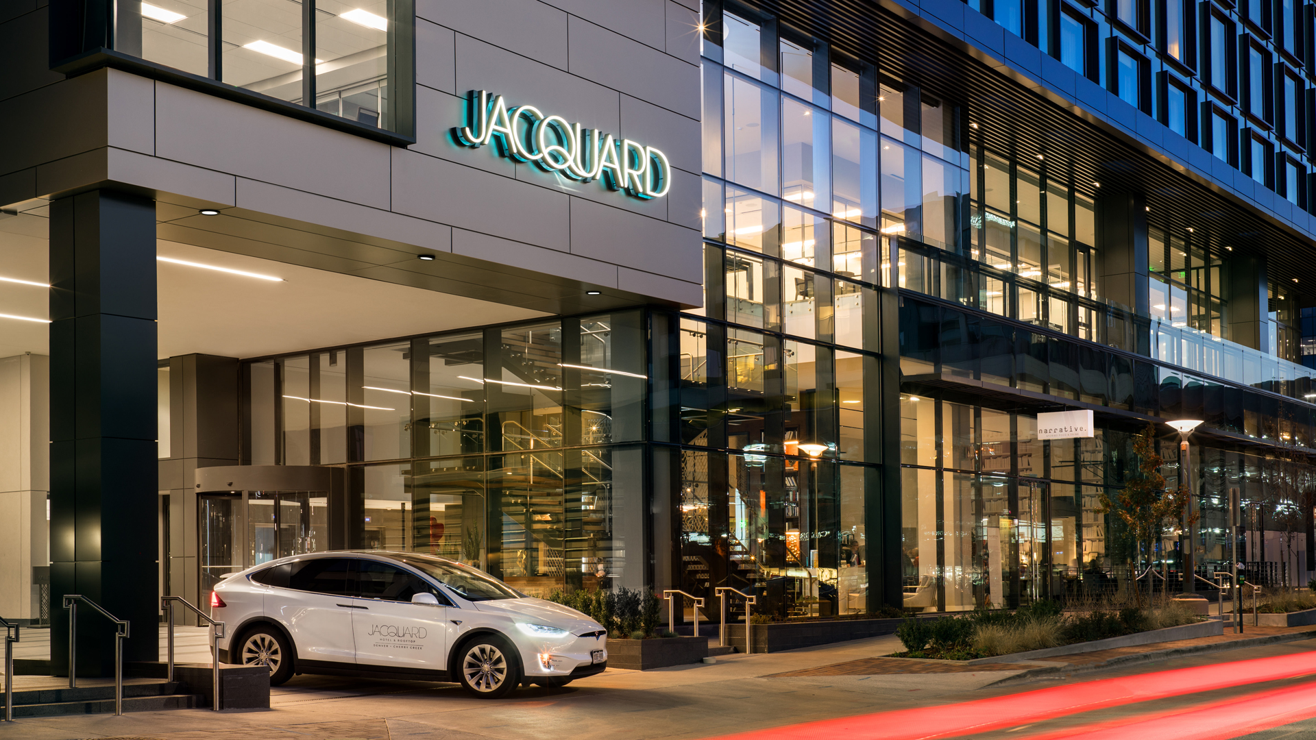 a car parked outside of a building main