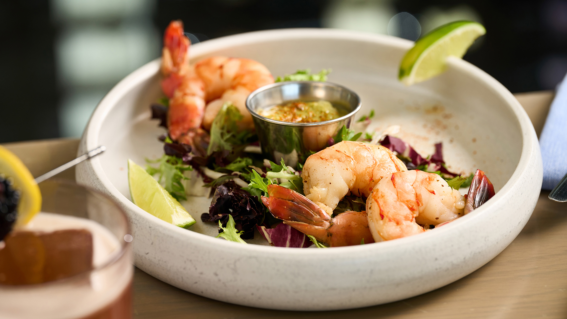 a plate of shrimp and salad main