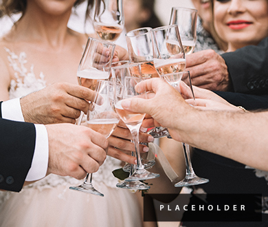 a group of people clinking wine glasses