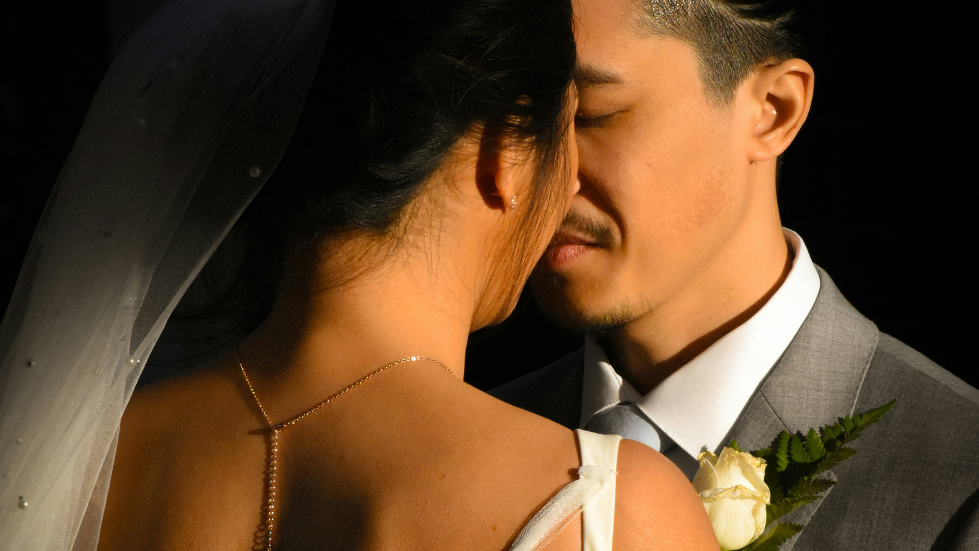 a man and woman kissing main