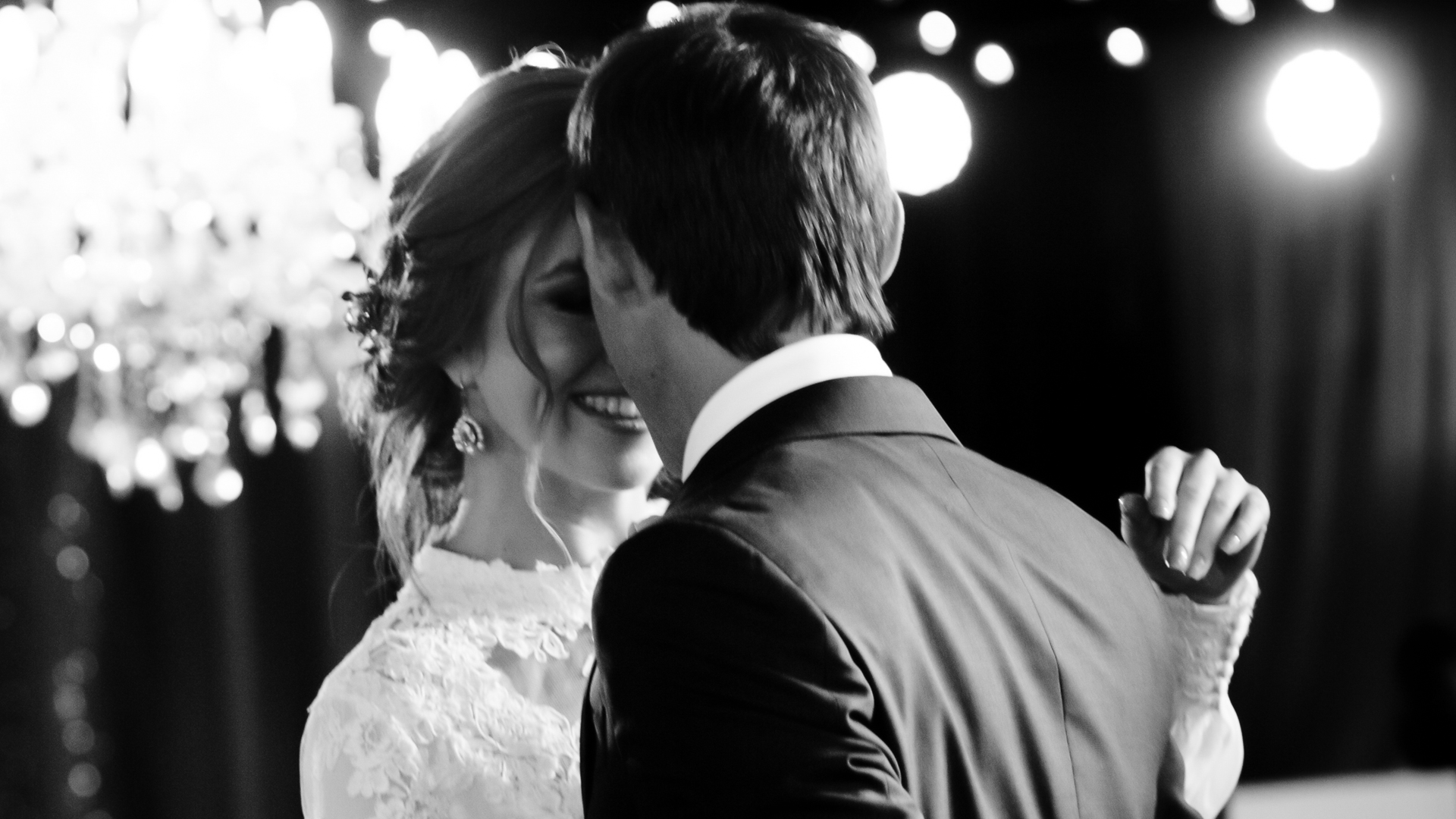 a man and woman in a white dress main