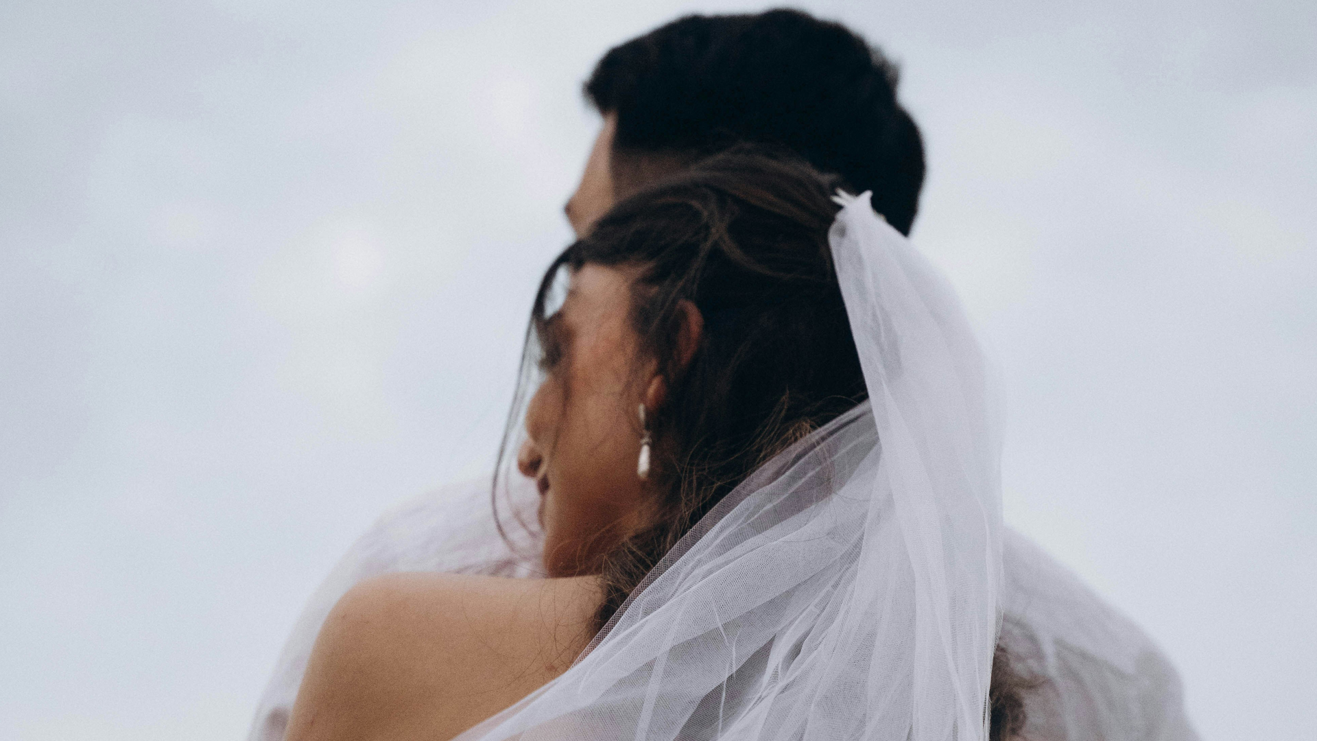 a bride and groom in a wedding dress main