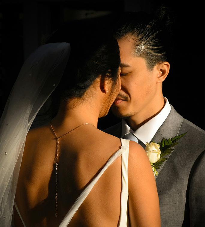 a man and woman kissing