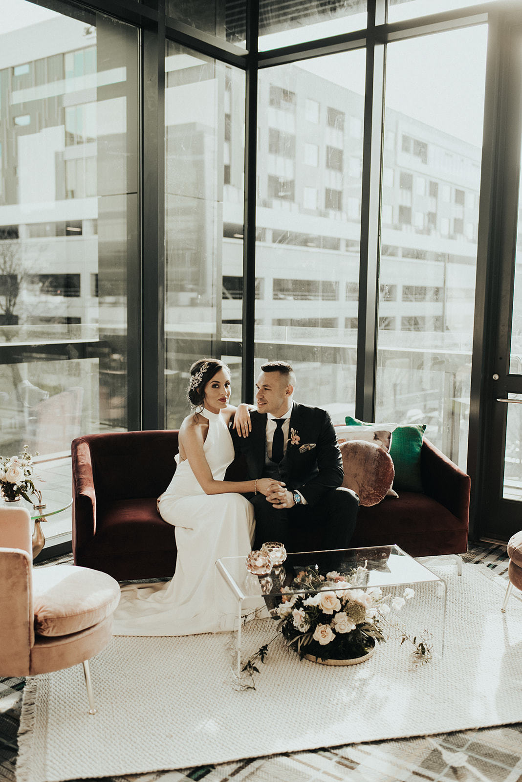 a man and woman sitting on a couch
