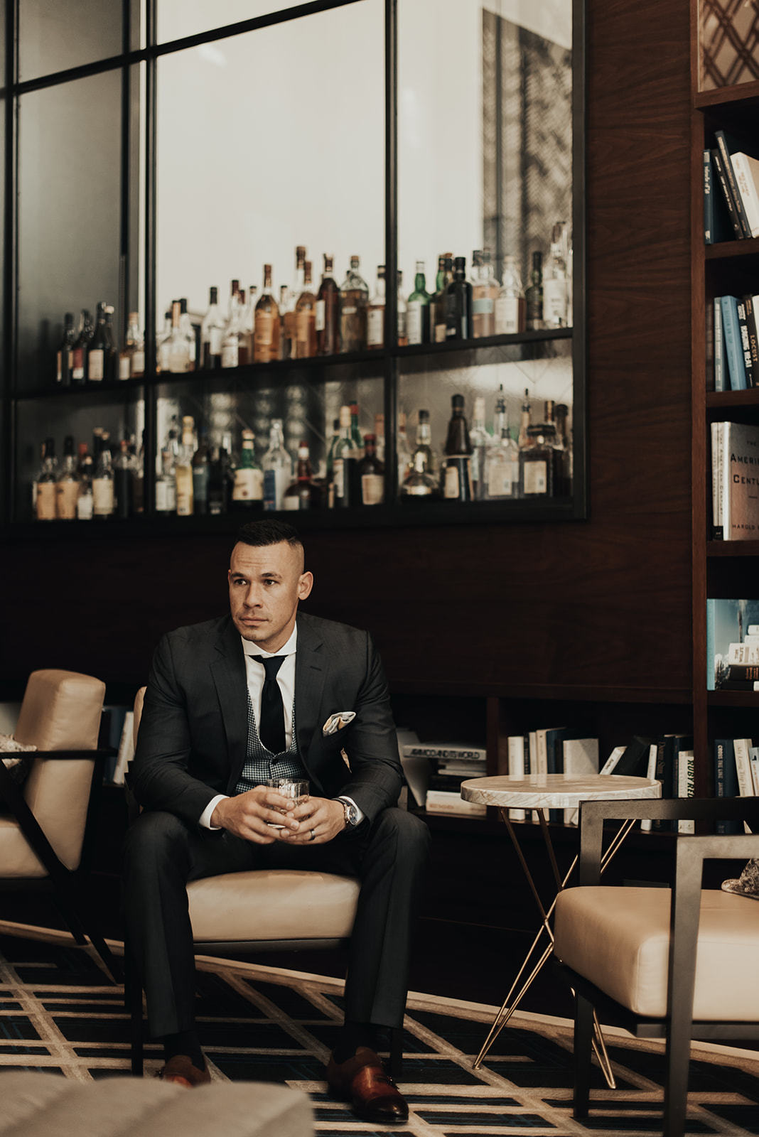 a man sitting in a chair main