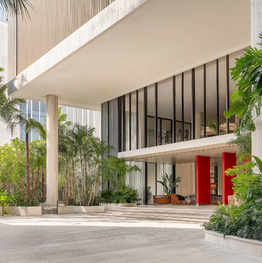 a building with plants around it