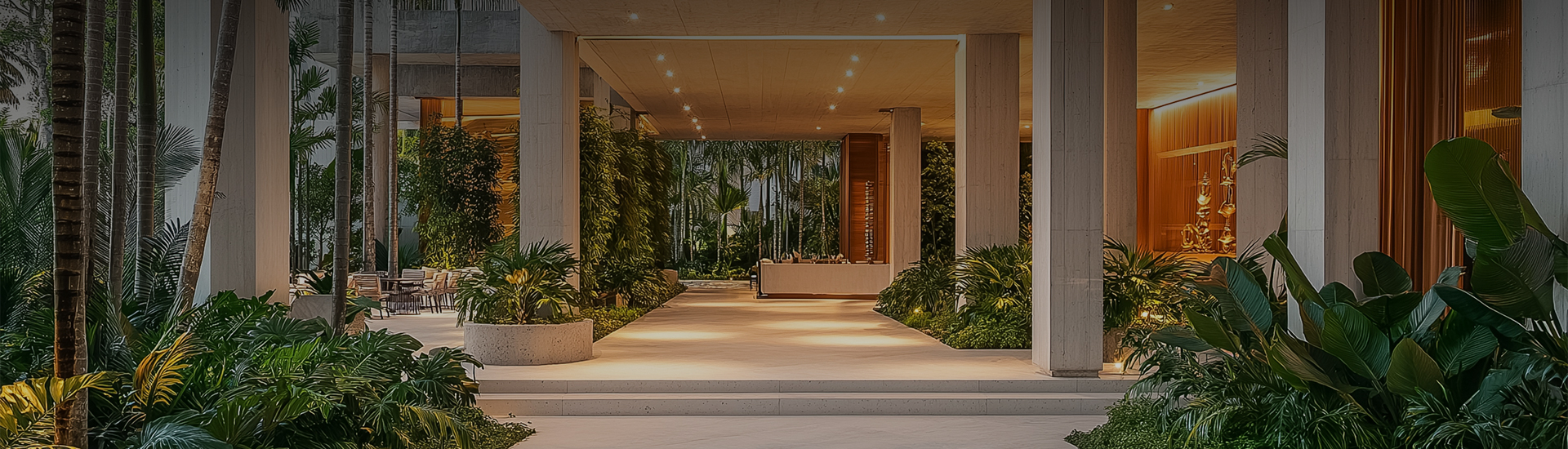 a building with plants and a porch
