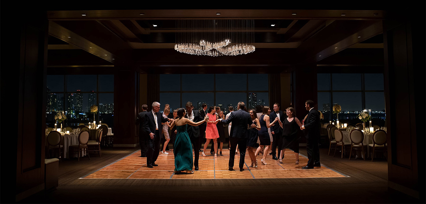 a group of people dancing in a room