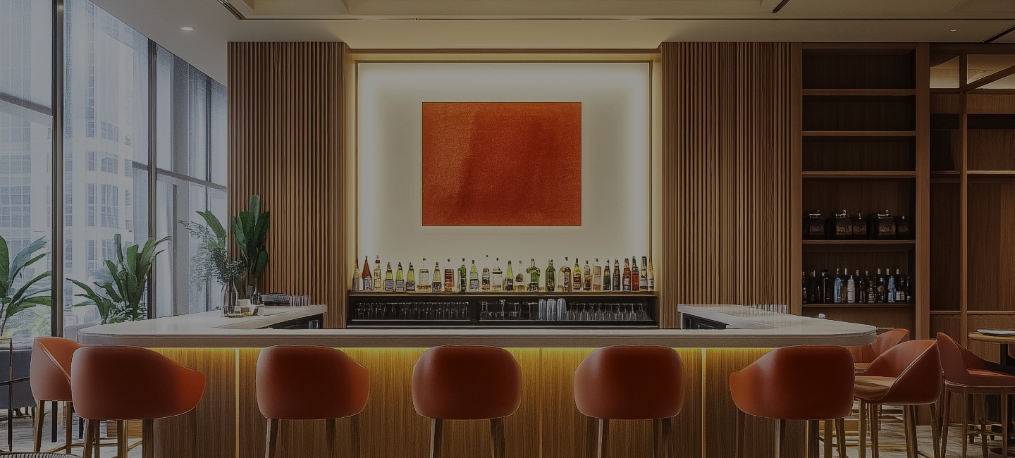 a bar with bottles and chairs