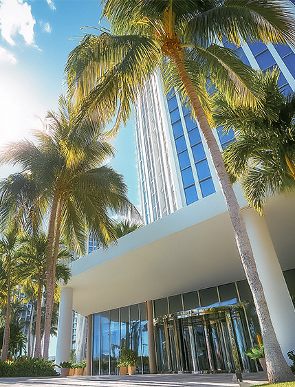 a building with palm trees